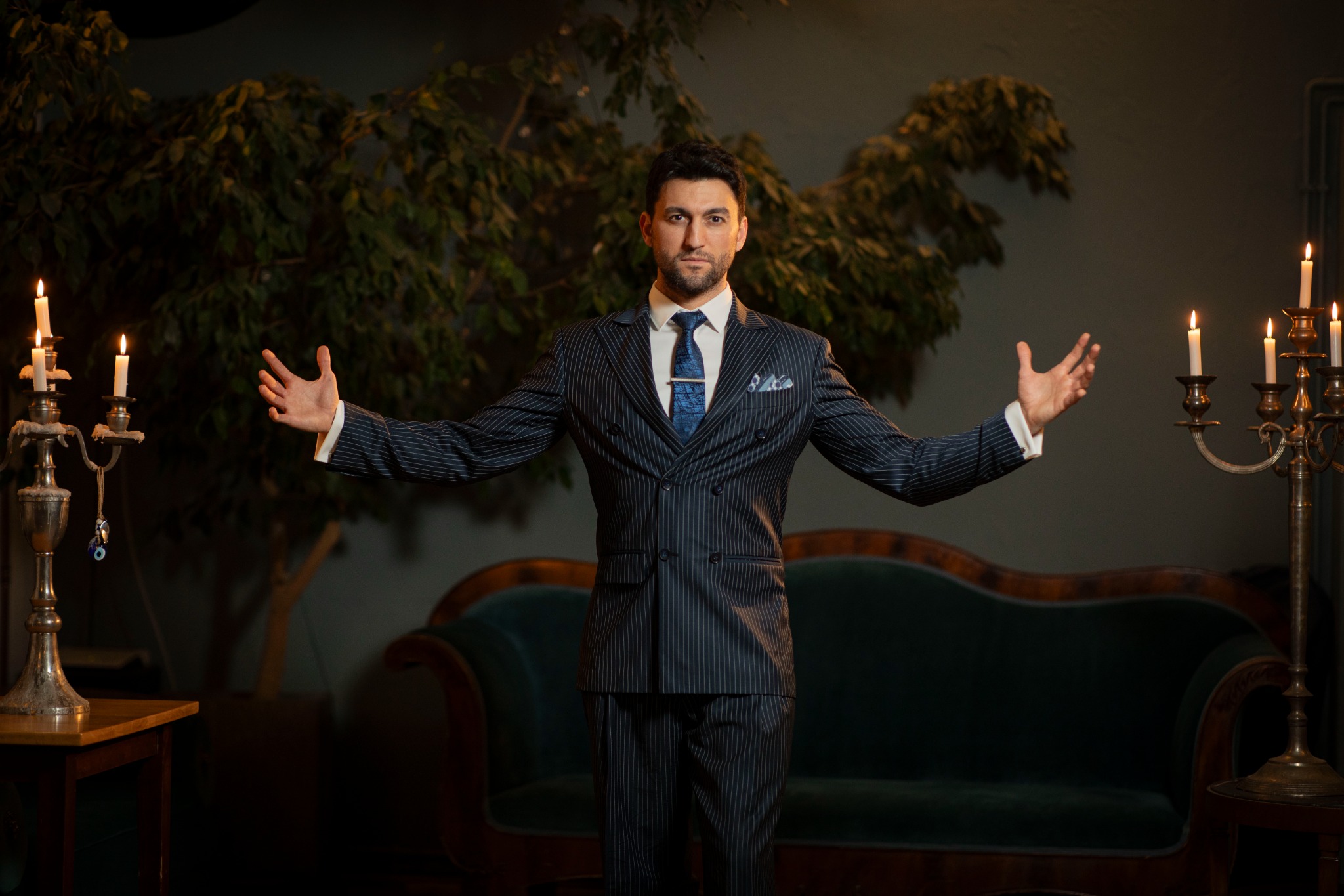 Onur in a blue suit