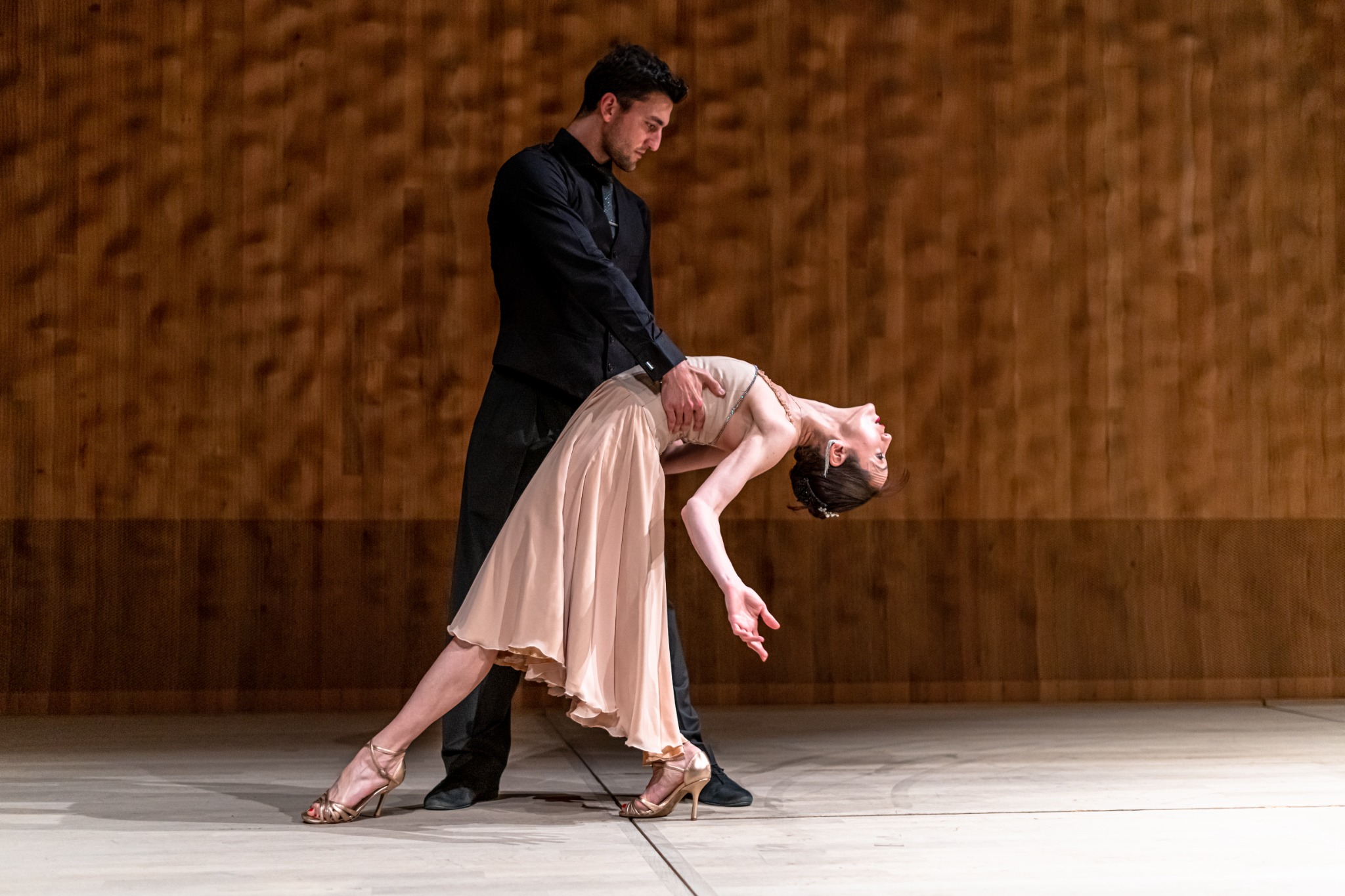 Onur and his dance partner performing on stage